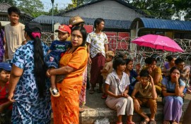 Relatives wait for the release of prisoners from Insein prison to mark the Myanmar New Year in Yangon