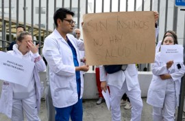 Doctors and nurses in Ecuador's capital protest dismissals in the state health care system