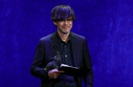 Japanese director Takashi Yamazaki says "Godzilla Minus Zero" will bring the massive lizard closer than ever before it cinema audiences