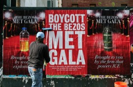 Activists have deployed posters to oppose Jeff Bezos's involvement in the Met Gala