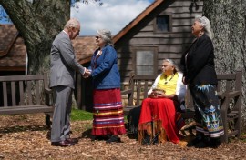 Britain's King Charles III speaks with members of the Monacan Indian Nation during a visit to Shenandoah National Park, in the US state of Virginia