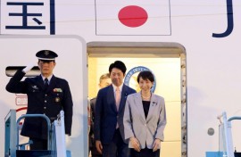 Japan's Prime Minister Sanae Takaichi (R) disembarks a plane upon arrival at Noi Bai International Airport in Hanoi on May 1, 2026.
