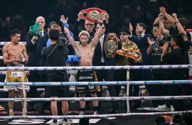 Japan's Naoya Inoue defeated Junto Nakatani by unanimous decision in their championship boxing bout to retain his undisputed super bantamweight titles at the Tokyo Dome