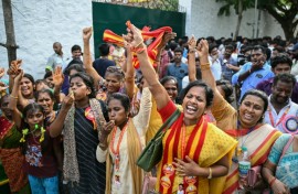 Supporters and members of Indian actor C. Joseph Vijay's Tamilaga Vettri Kazhagam party celebrate after TVK leads in Tamil Nadu Legislative Assembly elections