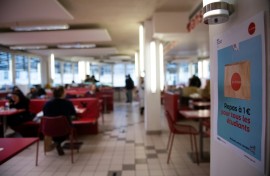 Diners have lunch at a university restaurant in France, where students get one-euro meals