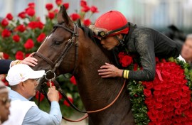 Jockey Jose Ortiz celebrates his Kentucky Derby victory aboard Golden Tempo