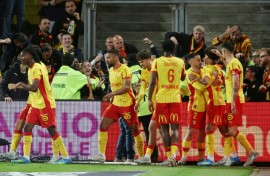 Lens celebrate after the goal from Mezian Mesloub Soares (2nd R) that secured them Champions League football next season