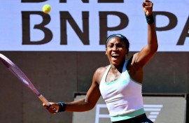 Coco Gauff celebrates reaching the quarter-finals of the Italian Open