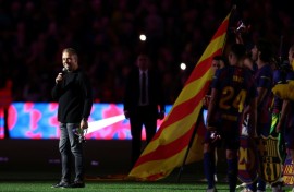 Hansi Flick speaks as Barcelona's players celebrate winning the 2025/26 La Liga title
