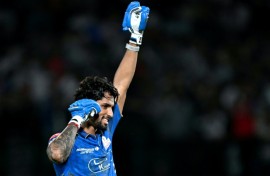 Tilak Varma celebrates after powering Mumbai Indians to victory over Punjab Kings.