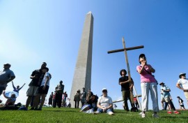 Christian worshippers gathered in the shadow of the Washington Monument for a weekend 'National Jubilee of Prayer' in the nation's capital