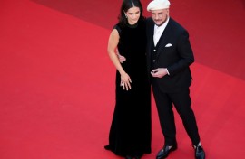 John Travolta (right) with his daughter, actress Ella Bleu Travolta at Cannes