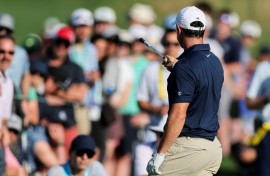 Six-time major winner Rory McIlroy yells at a heckler in the crowd who screamed while he was making a key shot at the par-five 16th hole in the final round of the PGA Championship