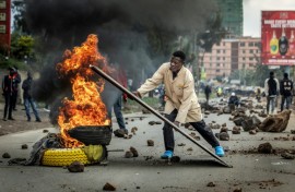 Kenya's public transport system was paralysed when protesters barricaded roads over fuel price hikes