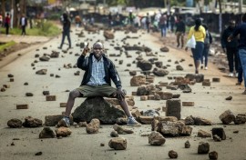 Kenya's public transport system was paralysed when protesters barricaded roads over fuel price hikes