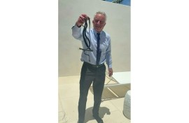 US Secretary of Health Robert F. Kennedy Jr. grabs two snakes with his bare hands, the latest example of his adventures involving animals