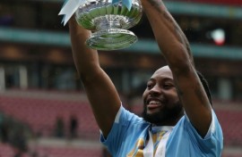 Antoine Semenyo holds aloft the FA Cup. His goal secured Manchester City a 1-0 win over Chelsea at Wembley
