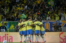 Brazil's players celebrate Vinicius Jr's opening goal in a 6-2 thrashing of Panama at the Maracana Stadium
