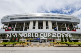 A freshly installed FIFA World Cup 2026 sign hangs over the entrance at Kansas City Stadium