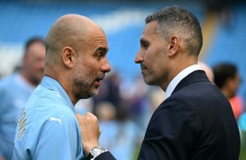 Pep Guardiola talks with Manchester City chairman Khaldoon Al Mubarak