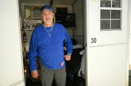 Michael Reyes poses inside a so-called tiny home in the Eagle Rock neighborhood of Los Angeles, California on June 1, 2026.