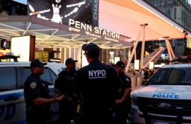 NYPD police officers are seen outside Penn Station in New York on June 7, 2026, after a stabbing attack inside the transit center