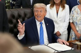 US President Donald Trump speaks during a signing ceremony for the "Secure America Act" in the Oval Office of the White House