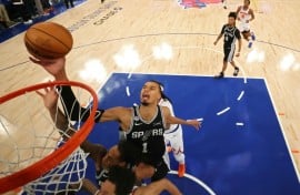 San Antonio's Victor Wembanyama takes a shot against the New York Knicks, who own a 3-1 lead in the best-of-seven NBA Finals