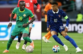 Senegalese journalists will be thinner on the ground for the World Cup duel between Senegal icon Sadio Mane (L) and French superstar Kylian Mbappe (R)owing to visa problems