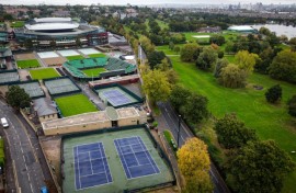 An aerial photograph taken on October 14, 2024 show a general view of the All England Lawn Tennis Club and of the Wimbledon Park Golf Course southwest London