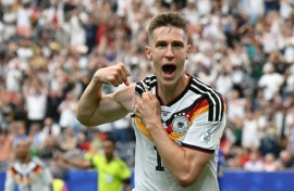 Nico Schlotterbeck celebrates after scoring against Curacao at the World Cup