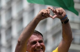 Brazil's yellow and green jerseys were co-opted years ago by conservatives loyal to former president Jair Bolsonaro, seen here