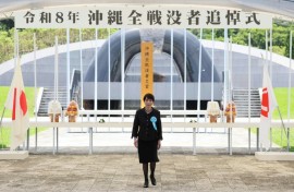 Japan's Prime Minister Sanae Takaichi walks away from the Peace Park Memorial after laying flowers for All War Dead, marking 81 years since the end of the Battle of Okinawa during World War Two