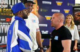 US boxer Floyd Mayweather Jr., left, and Greek kickboxer Mike Zambidis, right, reportedly will not fight on Saturday in an exhibition at Athens as originally announced