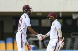 Amir Jangoo (R) will resume on the third morning on 78 in partnership with Roston Chase (L), who is 42 not out