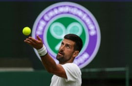 Serbia's Novak Djokovic practices at Wimbledon