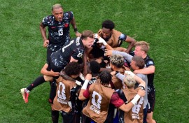 Canada's bench streamed onto the pitch as the stadium eruped
