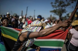 Protests have been fronted by men carrying sticks and shields