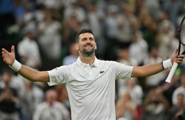 Serbia's Novak Djokovic celebrates beating China's Wu Yibing.