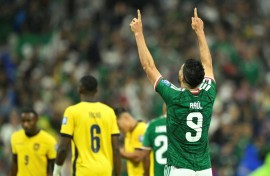 Mexico forward Raul Jimenez celebrates scoring against Ecuador in the World Cup round of 32 at the Azteca Stadium