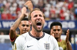 England captain Harry Kane celebrates after scoring the goals that saw England defeat DR Congo 2-1
