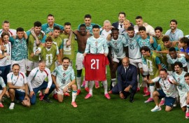 Cristiano Ronaldo and teammates celebrate with a shirt in commemoration of late teammate Diogo Jota after their win over Portugal