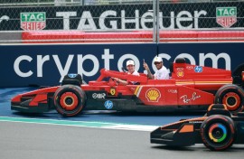 Charles Leclerc drives with Lewis Hamilton a passenger in a Lego Ferrari in Miami in May