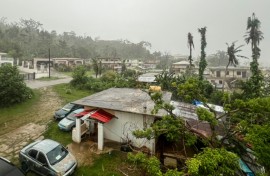 Heavy rain was falling in Saipan, the main island of the Northern Marianas, as Super Typhoon Bavi approached