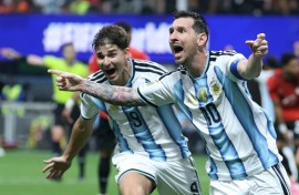 Lionel Messi celebrates scoring Argentina's second goal