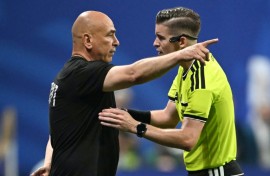 Egypt coach Hossam Hassan remonstrating with referee Francois Letexier