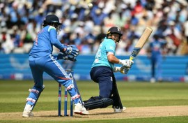 England's Joe Root (R) reverse-sweeps during his 76 not out against India in the first one-day international at Edgbaston