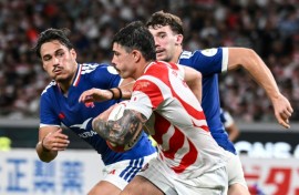 Japan's Dylan Riley makes a run against France in Tokyo during his side's 42-15 defeat