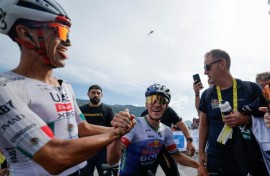 A leaner meaner Remco Evenepoel (C) has proved he can mix it with the best climbers at the Tour de France