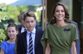 Britain's Prince George of Wales, flanked by Princess Catherine and Princess Charlotte, has become a teenager